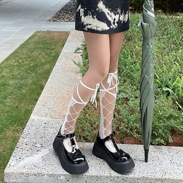 Calcetines de rejilla Jk calcetines de malla de seda negra pantalones huecos Europa y Estados Unidos sexy caliente delgado largo