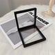 thumbnail image 5 of Yuarrent 10 piezas transparentes 3D marcos de joyería soporte caja de exhibición películas de almacenamiento hebilla pendientes collares Almacenamiento y organización del hogar Negro 9x9x2cm, 5 of 6