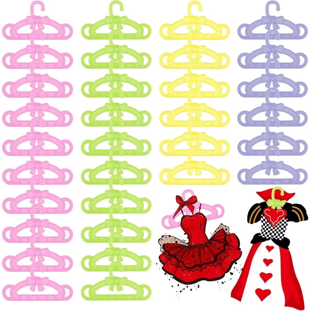 Juego de 40 perchas pequeñas de plástico con lazo, en 4 colores. Accesorios para colgar ropa. Medidas: 4 x 2 pulgadas.