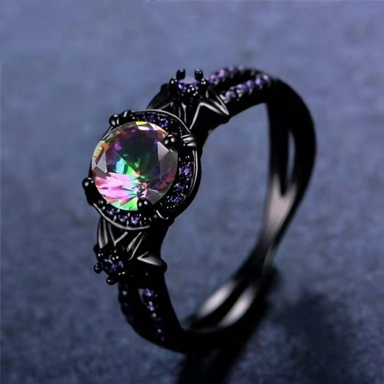 Black ring 2024 with purple diamond