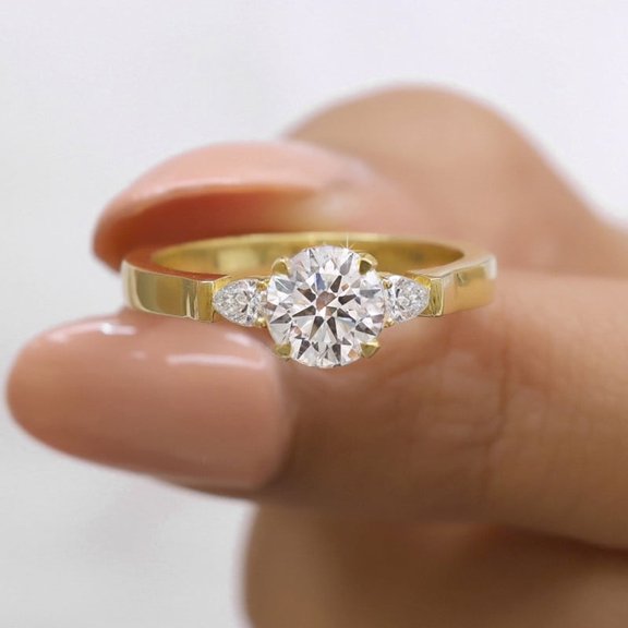 Jewelegant 1.50 CTW Round Brilliant & Pear Cut Moissanite Three Stone Engagement Ring for Women