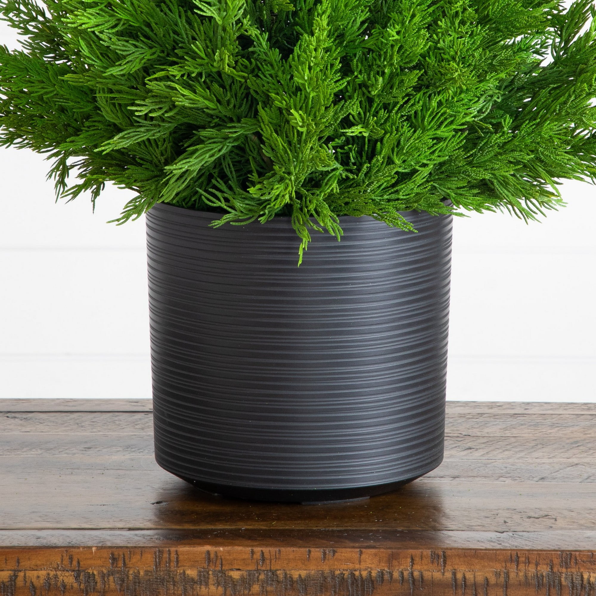 28in. Artificial Real Touch Winter Cypress Bush in Black Decorative Planter
