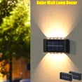 thumbnail image 2 of Luces solares de pared para exteriores, iluminación luminosa impermeable hacia arriba y hacia abajo, 10LED, decoración de jardín, balcón y patio, 2 of 4