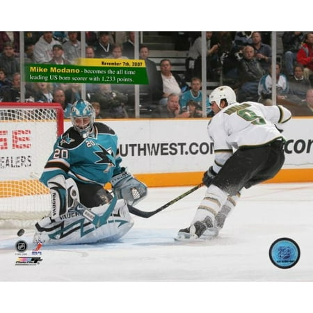 Mike Modano- Sets the NHL Record for career points by an American-born player 1233 points Photo