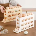 thumbnail image 4 of Caja de almacenamiento de huevos deslizante de 4 capas con puerta lateral para refrigerador, bandeja para huevos de grado alimenticio con ruedas automáticas, 4 of 6