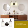 thumbnail image 4 of Kichler Kennewick Luminaire de Bain à 2 Lumières en Bronze Ancien avec Verre Gravé, 4 of 7
