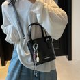 thumbnail image 4 of Bolso de hombro tipo cubo con tendencia de color en contraste retro para mujer, nuevo estilo 2025, bolso de hombro versátil a la moda, diseño de nicho, bolso de mano sencillo, 4 of 5