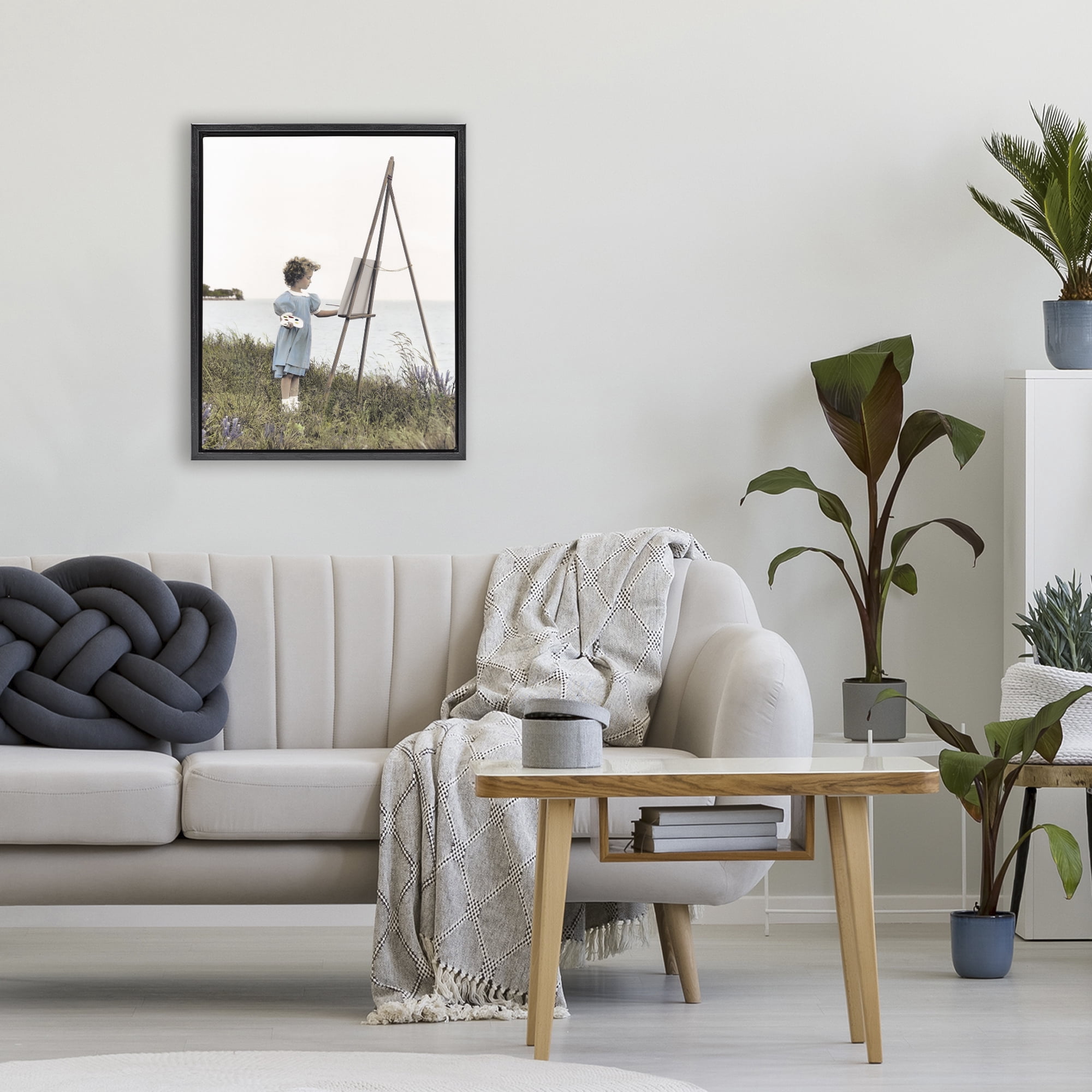 Stupell Industries Child Painting on Easel Black Framed Floater Canvas Wall Art, design by Kendra Dew