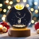 thumbnail image 4 of Adornos navideños, regalos navideños, luces de cristal para árbol de Navidad y bola de cristal de reno, luz nocturna grabada estéreo con base de madera, decoración o regalo navideño único, luz de noch, 4 of 9