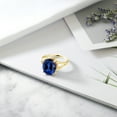 thumbnail image 4 of Gem Stone King 18K Yellow Gold Plated Silver Blue Created Sapphire Ring for Women (6.00 Cttw, Gemstone September Birthstone, Oval 12X10MM, Available in Size 5,6,7,8,9), 4 of 5