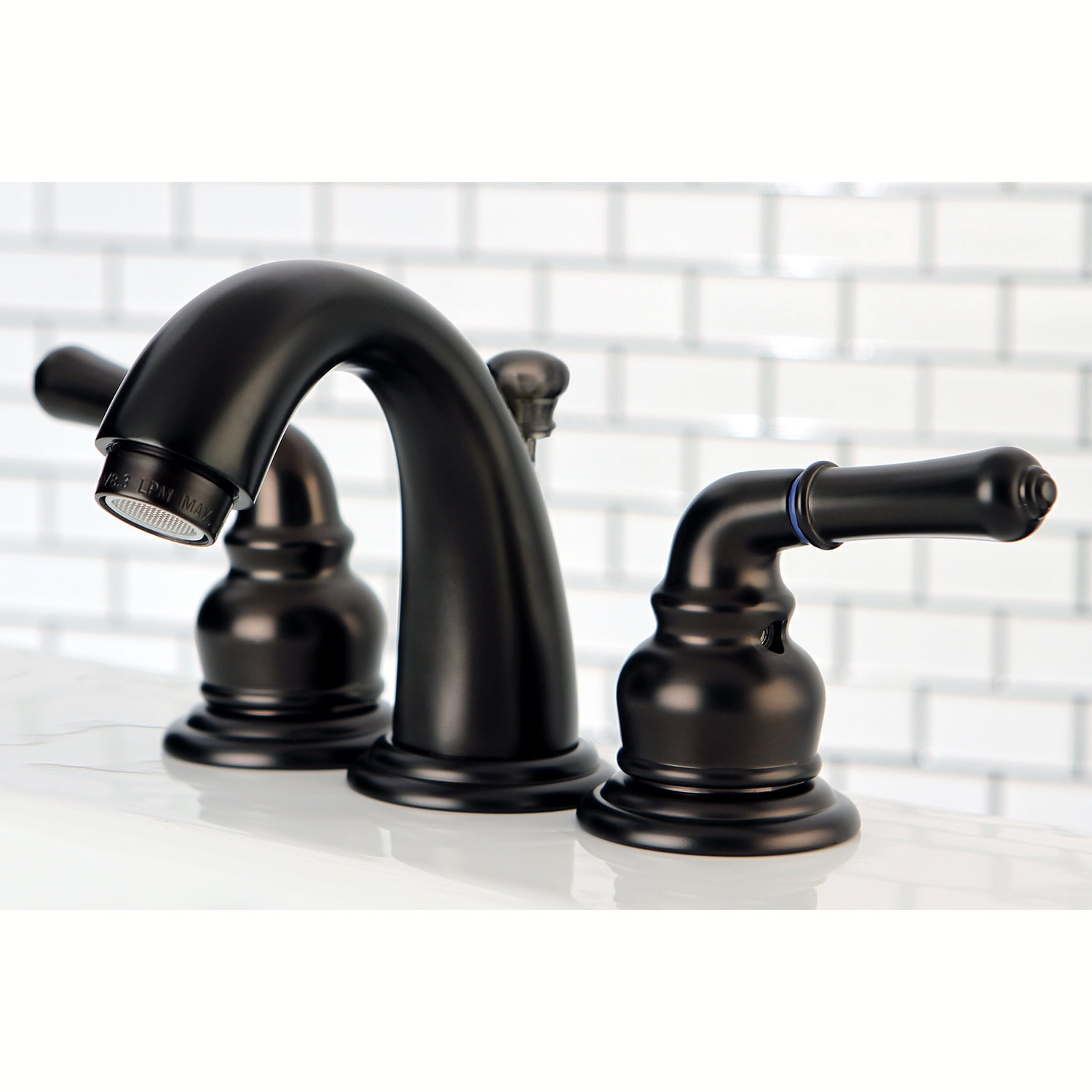 Kingston Brass Magellan Two Handle 4" to 8" Mini Widespread Lavatory Faucet with Retail Pop-up