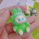 thumbnail image 4 of Mini figuras de acción de Labubu para niños, muñecos de postura sentada, modelo Kawaii, decoración de escritorio, accesorios de adornos, regalo, 10 piezas, 4 of 5