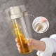 thumbnail image 3 of Botella dispensadora de Aceite de Oliva Cocina - Dispensador de aceite de vidrio con boquilla de acero inoxidable, 3 of 5