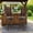 Carbonized, variant on EPICOZY Wood Adirondack Swivel Bar Chairs Set of 2, Rustic Outdoor Solid Log Bar Stools with High Back, 500 LBS Capacity, 29.9" Patio Counter Height Chair for Porch, Deck, Pub, Cabin, Natural