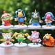 thumbnail image 1 of 8 digital baby figurines, trendy clothing, adventure, ancient beasts, dilu dolls, cake decorations, car ornaments, 1 of 5