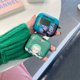 thumbnail image 4 of Funda protectora blanda para auriculares Airpods de tercera generación con diseño de dibujos animados de Kawaii, One Piece, sombrero de paja, Luffy y Zoro sonrientes, 4 of 5
