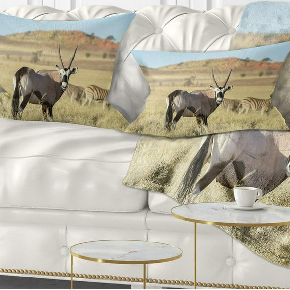 Designart Wildlife in Namibia Grassland - African Throw Pillow - 12x20