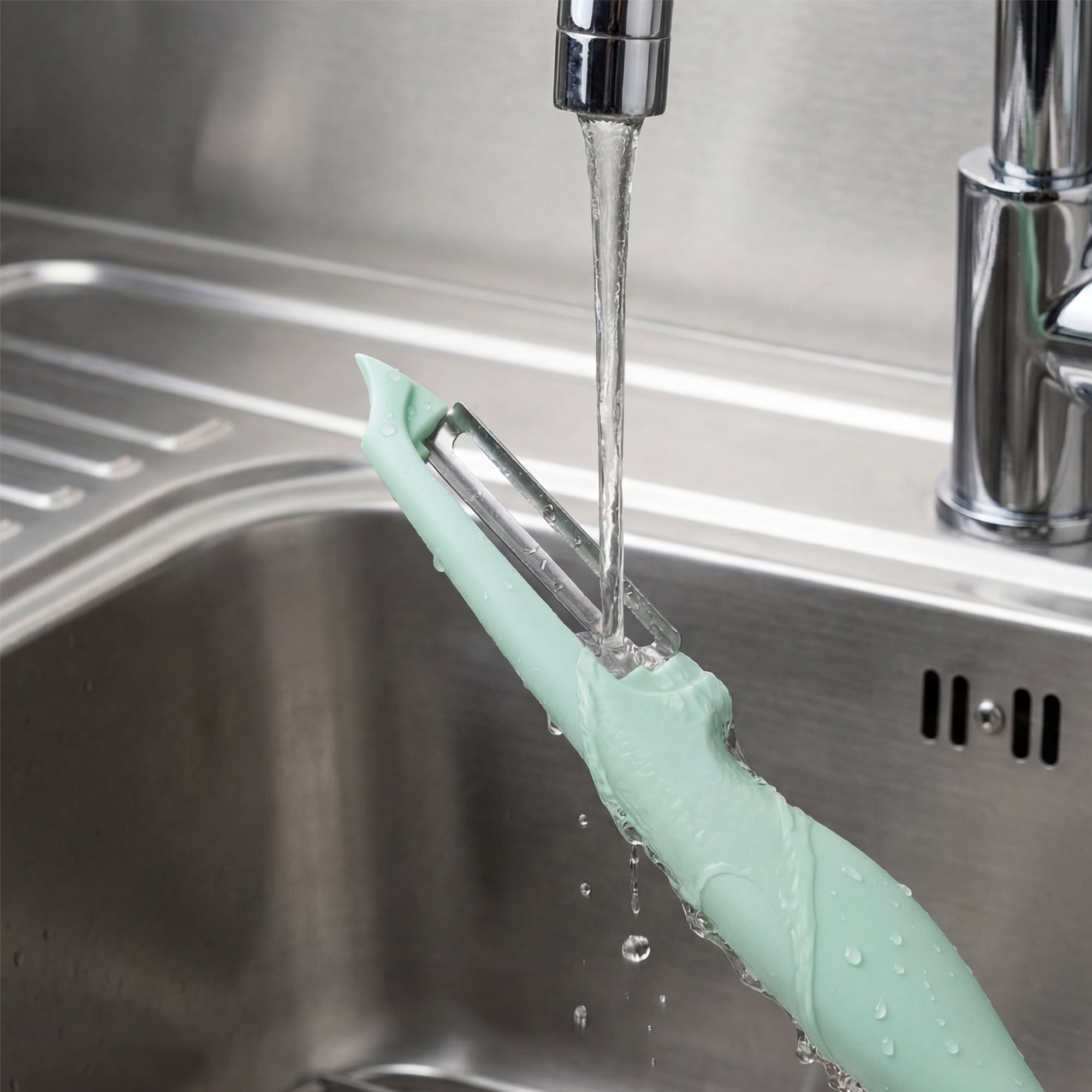 Unique Bargains Plastic Vegetable Peeler with Ergonomic Handle for Peeling Teal 7.3x1 inch