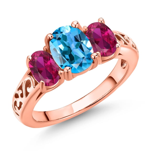 Gem Stone King 18K Rose Gold Plated Silver Swiss Blue Topaz and Red Created Ruby Filigree Style 3 Stone Ring for Women (2.50 Cttw, Oval 8X6MM and 6X4MM) (Size 8)