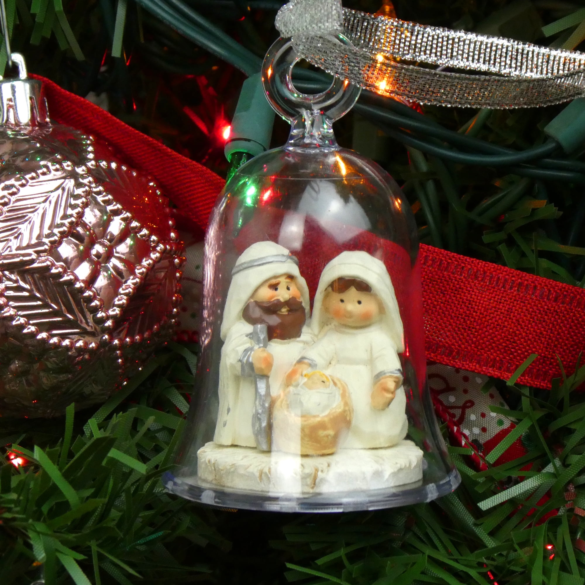 3 pack of Nativity Scene Christmas Tree Ornaments– Adorable Miniature Holy Family figurine Featuring Mary, Joseph and Baby Jesus inside a clear Acrylic Bell shaped Decoration with Silver Ribbon Bow.