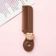 thumbnail image 1 of Mini Peine de Color Caramelo para Niños: Diseño En Forma de Corazón, Cerdas Circulares Suaves para Cuero Cabelludo Sensible, Herramienta Portátil de Peinado de 11,5 Cm., 1 of 3