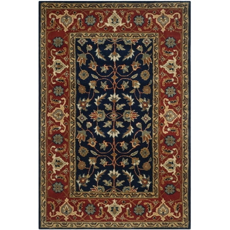 Safavieh SAFAVIEH Royalty ROY257A Handmade Navy / Rust Rug SAFAVIEH Royalty ROY257A Handmade Navy / Rust Rug Handmade from a blend of New Zealand and Indian Bikaner wool  the exquisite rugs in the Royalty Collection make a beautiful statement in traditionally styled homes. These rugs are inspired by classic Oriental motifs that add cultured charm to the dining room  bedroom  foyer  living room  or home office. Rug has an approximate thickness of 0.5 inches. For over 100 years  SAFAVIEH has set the standard for finely crafted rugs and home furnishings. From coveted fresh and trendy designs to timeless heirloom-quality pieces  expressing your unique personal style has never been easier. Begin your rug  furniture  lighting  outdoor  and home decor search and discover over 100 000 SAFAVIEH products today.