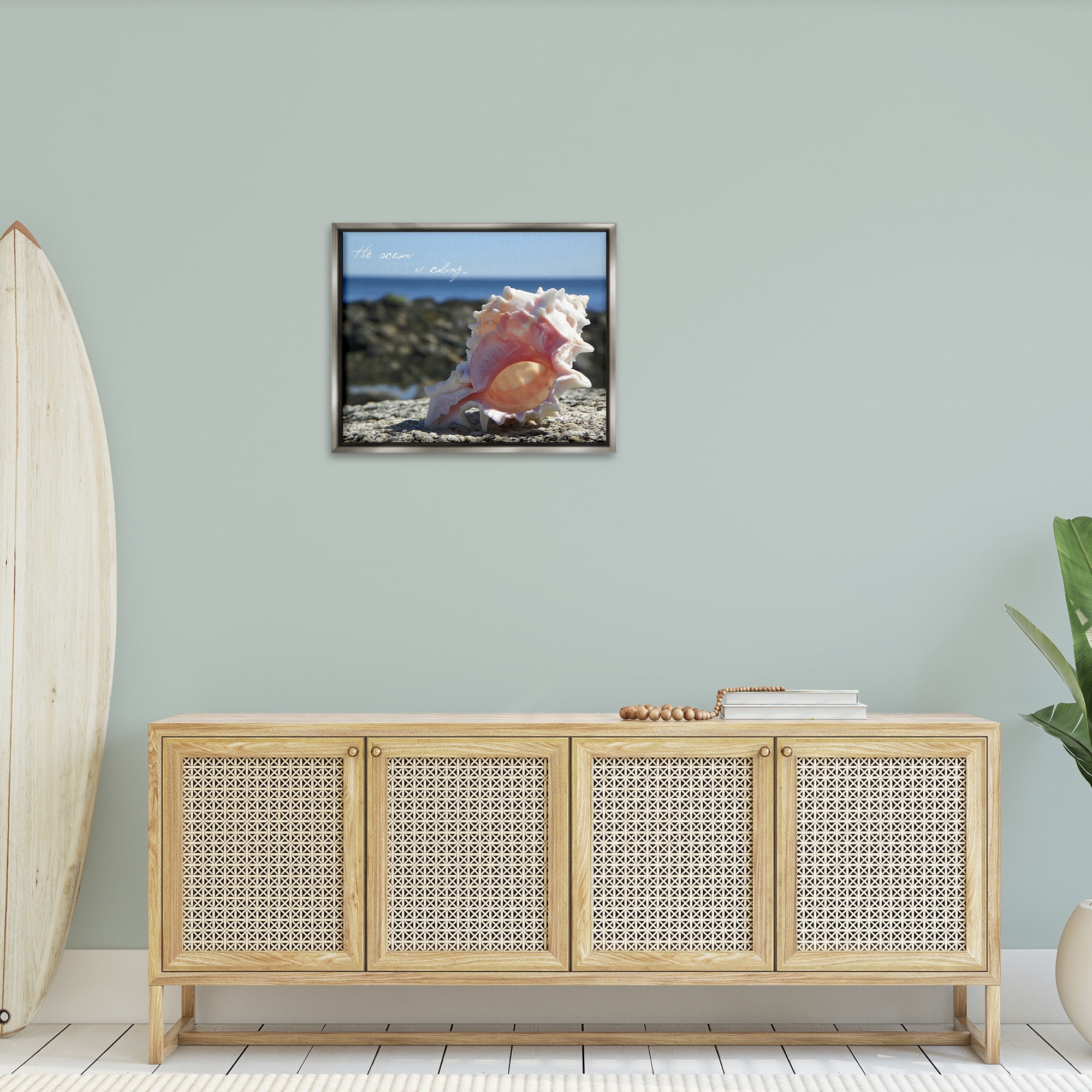Stupell Industries Ocean Is Calling Conch Typography Photography Gray Floater Framed Canvas Art Print Wall Art, 31 x 25
