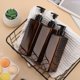 thumbnail image 5 of Botellas de champú marrones, paquete de 3 botellas vacías de 500 ml, dispensador de jabón de plástico recargable a prueba de fugas para cocina y baño, 5 of 5
