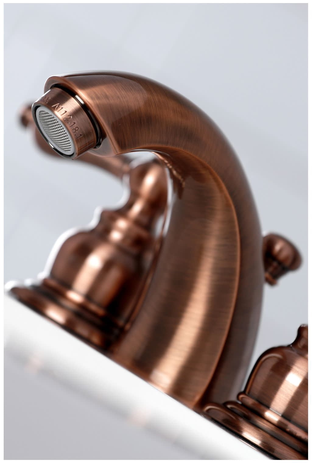 Kingston Brass Victorian Two Handle 4" to 8" Mini Widespread Lavatory Faucet with Retail Pop-up