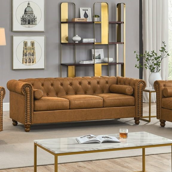 Luxurious Air Leather Chesterfield Sofa, 3-Seater with Rolled Arms, Tufted Design, Nailhead Accents, and Neck Roll Pillows for Cozy Living Spaces