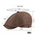 thumbnail image 2 of Una gorra negra unisex con botón de pan, gorra de periódico, gorra octogonal para hombre, 2 of 5