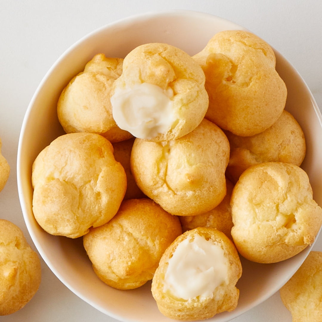 Poppies Mini Cream Puffs, Ready-to-Eat Pastry Filled with Rich Vanilla Dairy Cream, 17.6 oz (Frozen)