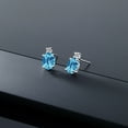 thumbnail image 4 of Gem Stone King 14k White Gold Swiss Blue Topaz and White Diamond Earrings for Women (2.73Cttw, GemstoneNovember Birthstone, Oval Checkerboard 8X6MM, Round 2.5MM), 4 of 5