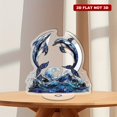 thumbnail image 1 of Rotatable acrylic display features hyper-realistic stained glass dolphins jumping over waves in dark blue and white tones against a pure white background, 1 of 8