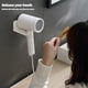 thumbnail image 3 of Ounissouiy Soporte para secador de pelo, soporte de almacenamiento de instalación Simple, estante de almacenamiento para baño montado en la pared, Almacenamiento y organización del hogar Blanco Ounissouiy HA081073-01, 3 of 6