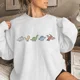 thumbnail image 2 of Sudadera con estampado de dinosaurio, jerséis casuales de cuello redondo y manga larga para otoño e invierno, sudaderas de gran tamaño para mujer, 2 of 5