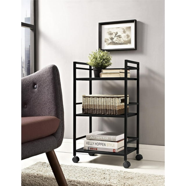 Black Ameriwood Marshall 3 shelf metal rolling utility cart with books, potted plant, and woven basket in contemporary living space.