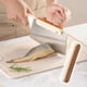 thumbnail image 3 of Afilador de cuchillos de cocina 2 en 1 con protector de mano y almohadilla trasera para cortar verduras sin esfuerzo. Su mango ergonómico reduce la fatiga de NCHKUN, 3 of 8