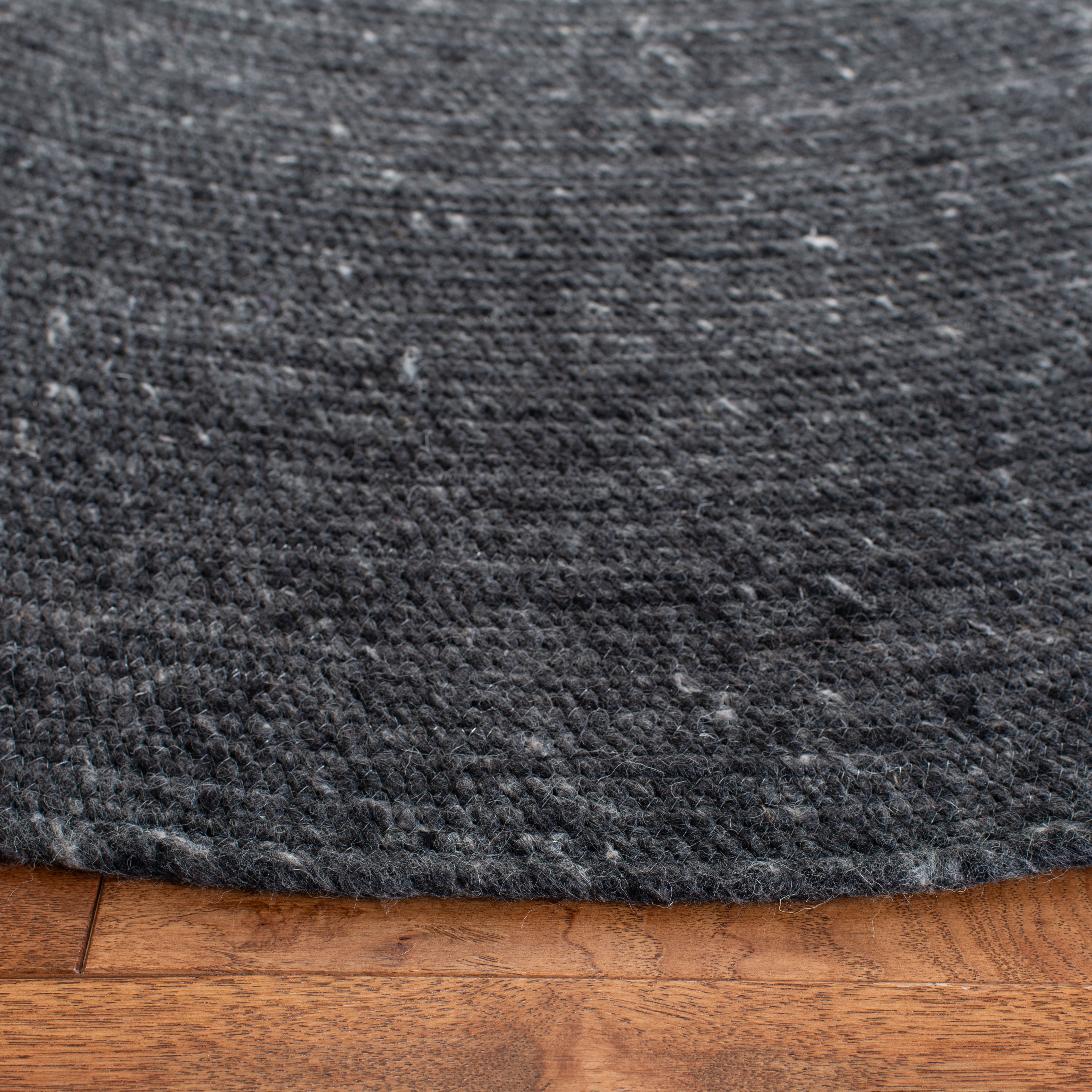 SAFAVIEH Braided Ronan Solid Reversible Area Rug, Black, 7' x 7' Round