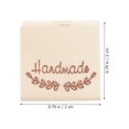 thumbnail image 4 of OULII 100Pcs Handmade with Beige Cotton Fabric Sewing Labels for Clothes and Crafts, 4 of 7