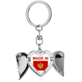 thumbnail image 1 of en montenegro, país de amor Llavero de alas de ángel en forma de corazón, 1 of 3
