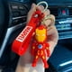thumbnail image 1 of Gran oferta de llaveros de personajes de dibujos animados, encantador bolso para llaves, llavero colgante para coche, llavero de juguete para mujer y niña, 1 of 4