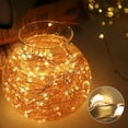thumbnail image 2 of guirnaldas de luces LED a pilas de 10 m, 100 LED, temporizador con mando a distancia, IP65 resistente al agua, decoración interior y exterior para Navidad, bodas, fiestas, hogar y jardín (amarillas)., 2 of 5