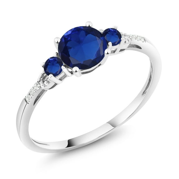Gem Stone King 10K White Gold Blue Created Sapphire and White Diamond Accent 3-Stone Engagement Ring for Women (1.14 Cttw, Round 6MM, Gemstone September Birthstone, Size 6)