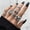 J0665, variant on New Personality Retro Punk Skull Ghost Claw Round Ring Set