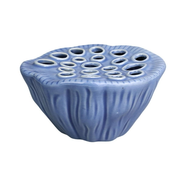 Jarrón con arreglo floral de vaina de loto, adorno ligero y creativo. Azul