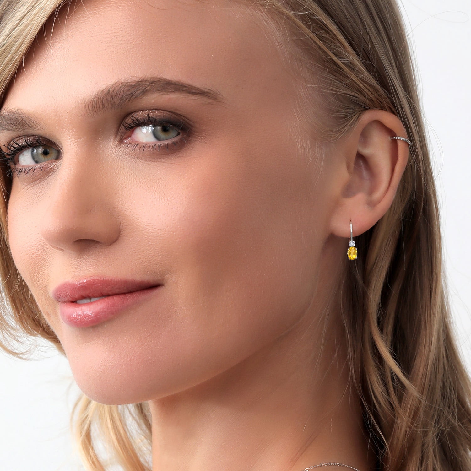 Gem Stone King 925 Sterling Silver Yellow Citrine and White Created Sapphire Leverback Earrings for Women (0.88 Cttw, Gemstone November Birthstone, Oval 6X4MM, Round 2MM, 3/4 inch)