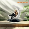 thumbnail image 6 of Revolving acrylic ornament featuring Rod Stewart on a half-moon beside a gift box, mounted on a glossy black oval base with a white background, 6 of 7