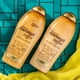 thumbnail image 3 of Exfoliante corporal y crema corporal OGX Smoothing Coconut Coffee, 3 of 8