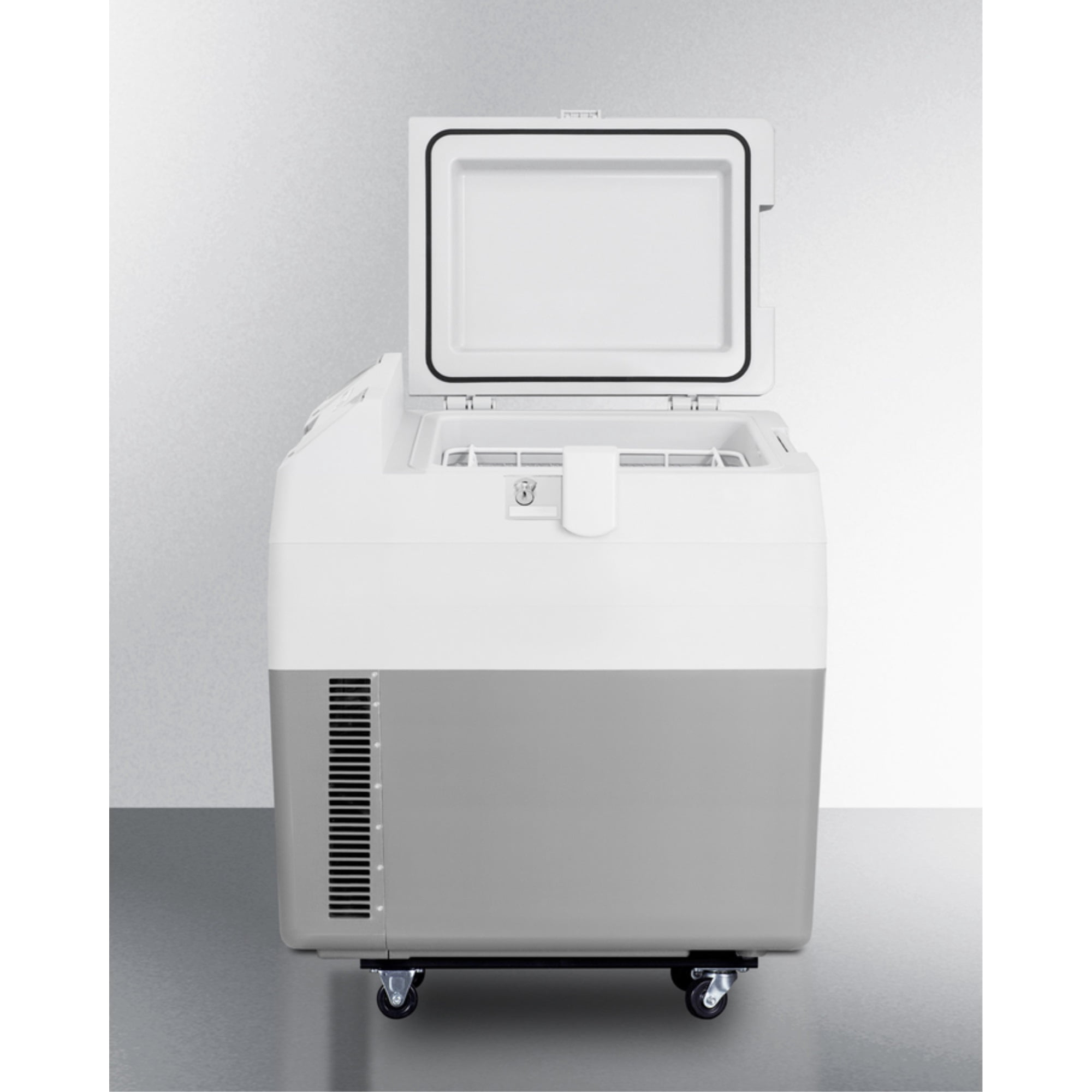 Portable 12V/24V medical cooler capable of operating at -12C or standard refrigerator temperatures, with lock and factory-installed wheels